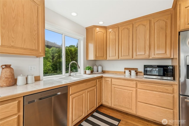 15428 SE 67th Pl, Bellevue, WA 98006 - kitchen featuring stainless steel appliances, a sink, light brown cabinets, and recessed lighting