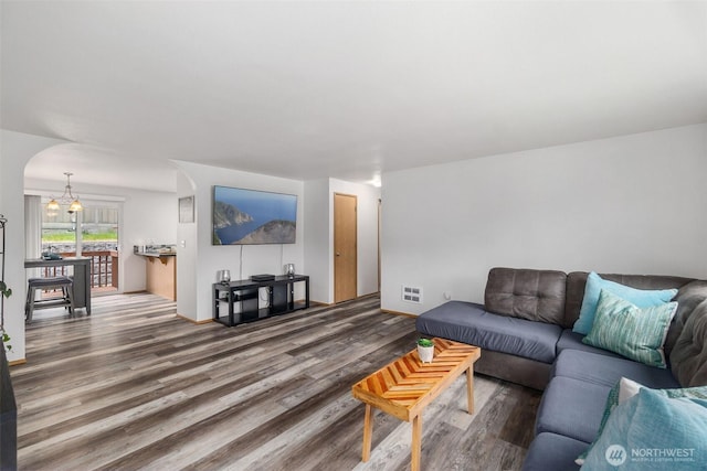 60 E Treewater Pl, Shelton, WA 98584 - living area with wood finished floors, a chandelier, and baseboards