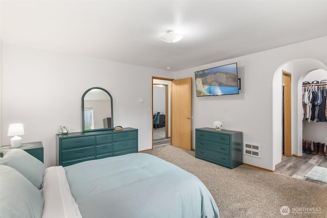 60 E Treewater Pl, Shelton, WA 98584 - bedroom featuring carpet, arched walkways, and baseboards