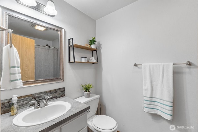 60 E Treewater Pl, Shelton, WA 98584 - bathroom with vanity, toilet, and a shower with shower curtain
