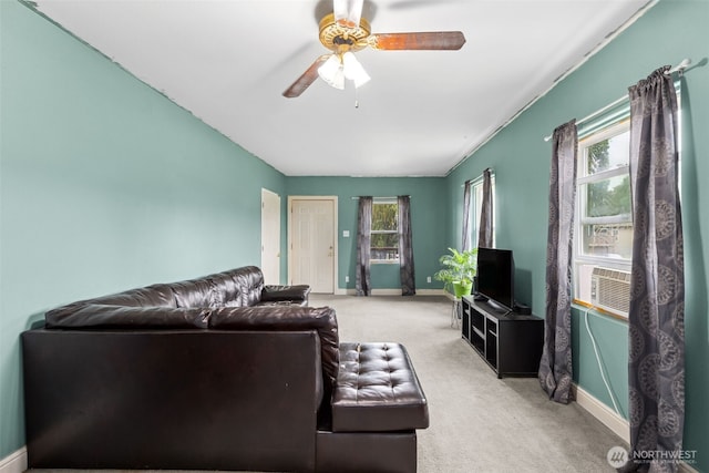 1025 NW Prindle St, Chehalis, WA 98532 - living room featuring ceiling fan, baseboards, and healthy amount of natural light