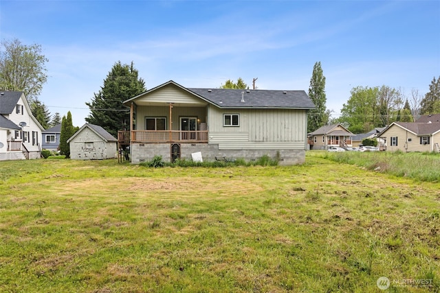 1025 NW Prindle St, Chehalis, WA 98532 - back of property with a yard, crawl space, and board and batten siding