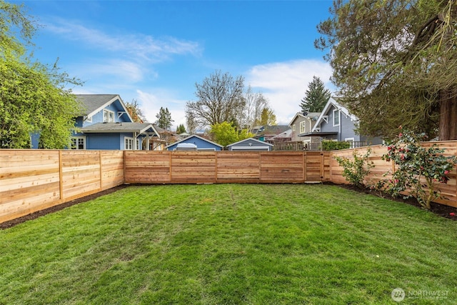 view of yard with a residential view
