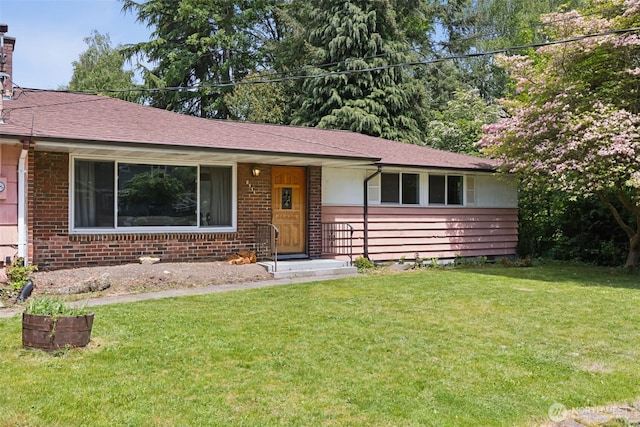 8511 31st St W, University Place, WA 98466 - ranch-style house featuring a front lawn, a chimney, and brick siding