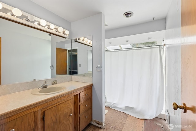 8511 31st St W, University Place, WA 98466 - full bath with vanity, wood finished floors, and toilet