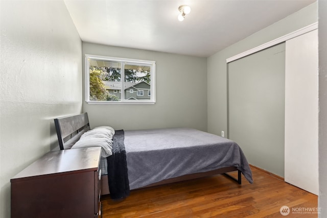 8511 31st St W, University Place, WA 98466 - bedroom with dark wood finished floors and a closet