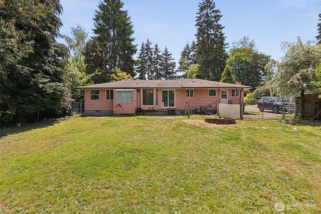8511 31st St W, University Place, WA 98466 - back of property featuring crawl space and a chimney