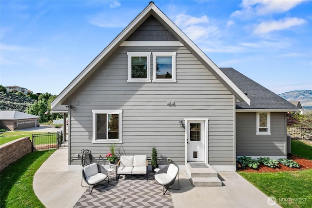 719 19th St NE, East Wenatchee, WA 98802 - back of property with a patio and outdoor lounge area