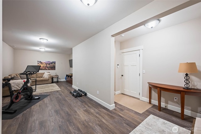 719 19th St NE, East Wenatchee, WA 98802 - exercise area featuring dark wood-type flooring and baseboards