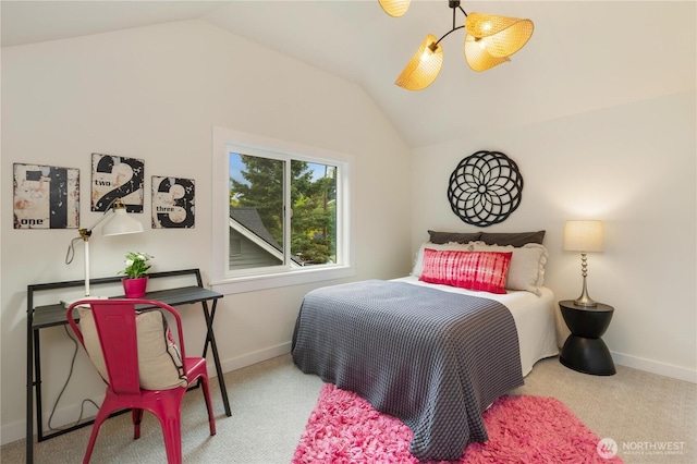 bedroom with vaulted ceiling, carpet flooring, and baseboards