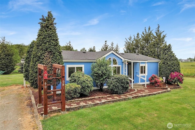 7135 W 40th Dr, Ferndale, WA 98248 - view of front facade featuring a front lawn and a shingled roof