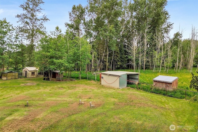 7135 W 40th Dr, Ferndale, WA 98248 - view of yard featuring an outbuilding and a carport