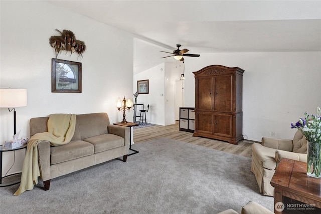 7135 W 40th Dr, Ferndale, WA 98248 - living room featuring ceiling fan, light wood-style flooring, and vaulted ceiling