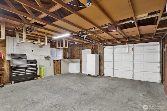 7135 W 40th Dr, Ferndale, WA 98248 - garage featuring freestanding refrigerator