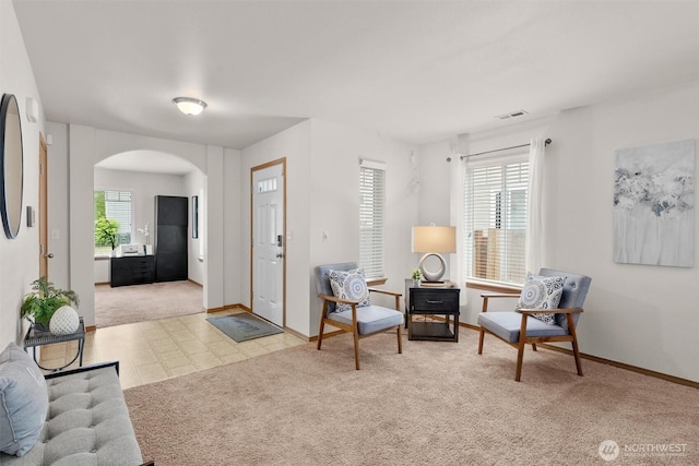 9604 201st Street Ct E, Graham, WA 98338 - sitting room with arched walkways and carpet