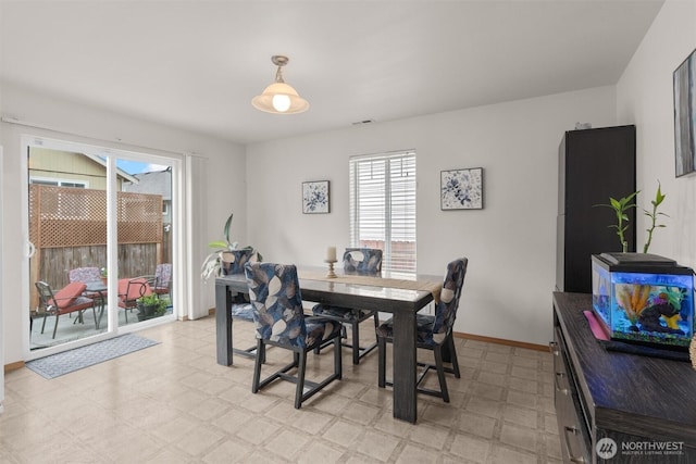 9604 201st Street Ct E, Graham, WA 98338 - dining room featuring light flooring and baseboards