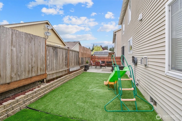 9604 201st Street Ct E, Graham, WA 98338 - fenced backyard featuring a patio area