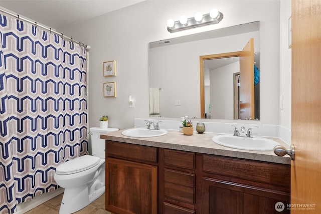 9604 201st Street Ct E, Graham, WA 98338 - full bathroom with double vanity, a shower with shower curtain, and tile patterned floors