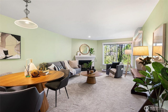 11307 NE 128th St Unit G204, Kirkland, WA 98034 - carpeted living area with a fireplace and a baseboard heating unit