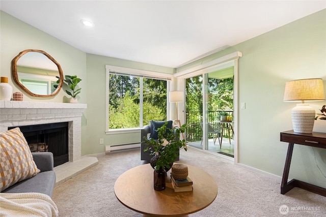 11307 NE 128th St Unit G204, Kirkland, WA 98034 - carpeted living room with a baseboard heating unit, a brick fireplace, baseboards, and recessed lighting