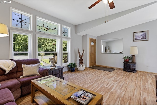 632 Meier Rd, Winlock, WA 98596 - living area featuring a ceiling fan, wood finished floors, baseboards, and a towering ceiling