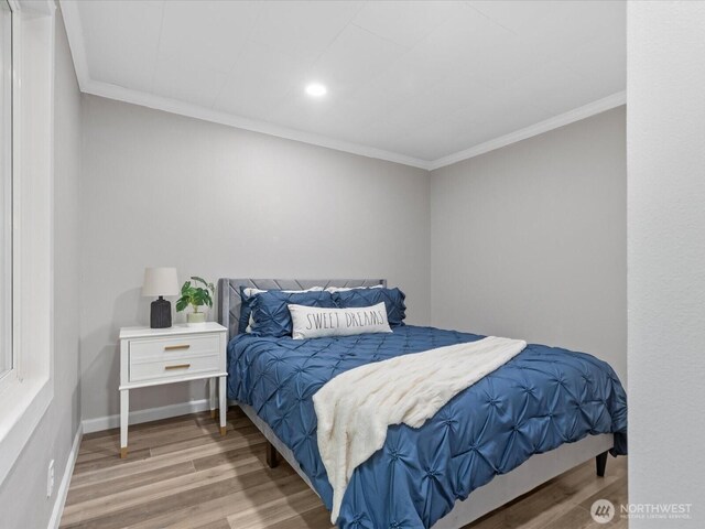 28611 139th Ave NE, Arlington, WA 98223 - bedroom featuring wood finished floors, ornamental molding, recessed lighting, and baseboards