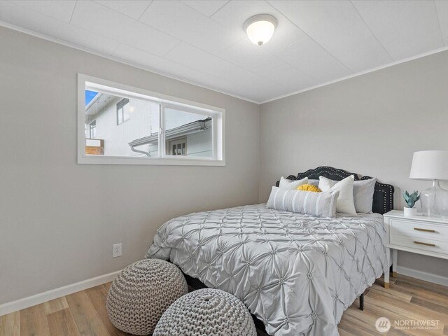 28611 139th Ave NE, Arlington, WA 98223 - bedroom with wood finished floors, ornamental molding, and baseboards