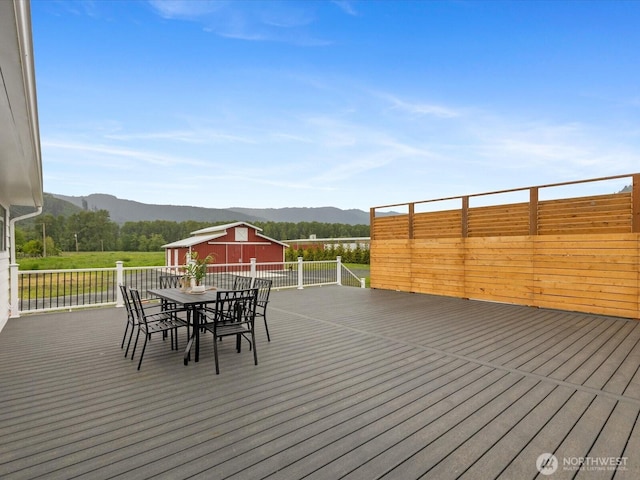28611 139th Ave NE, Arlington, WA 98223 - deck with a mountain view and outdoor dining area