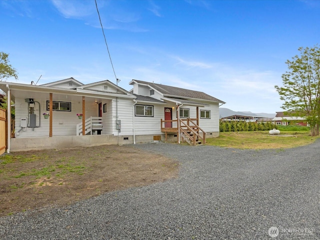 28611 139th Ave NE, Arlington, WA 98223 - view of front of property with crawl space, gravel driveway, and covered porch