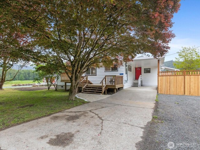 28611 139th Ave NE, Arlington, WA 98223 - view of front facade with concrete driveway and a carport