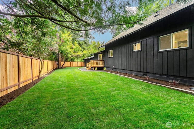 view of yard with a deck