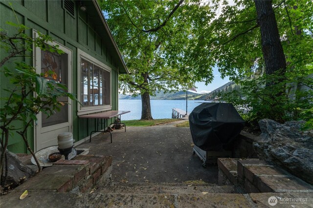 11194 S Lakeshore Rd, Chelan, WA 98816 - view of patio with a water view and grilling area