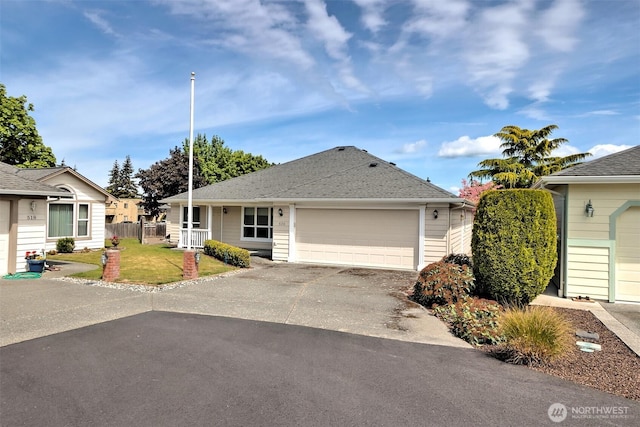 520 W Summer Breeze Ln, Sequim, WA 98382 - ranch-style home featuring driveway, an attached garage, and a porch