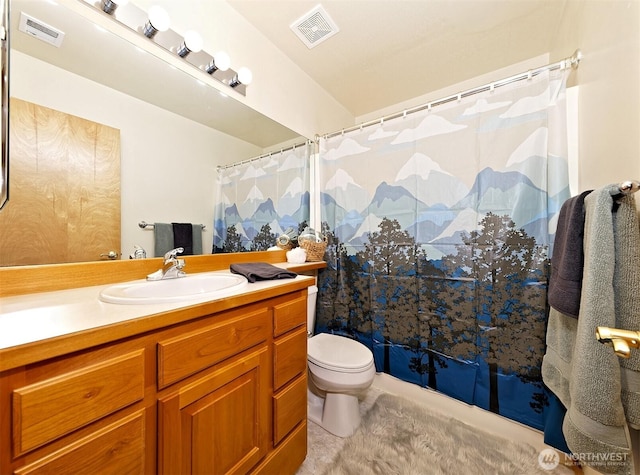 520 W Summer Breeze Ln, Sequim, WA 98382 - bathroom featuring toilet, vanity, and a shower with shower curtain