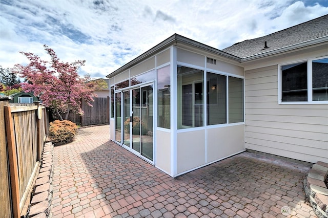 520 W Summer Breeze Ln, Sequim, WA 98382 - view of patio with a sunroom and a fenced backyard