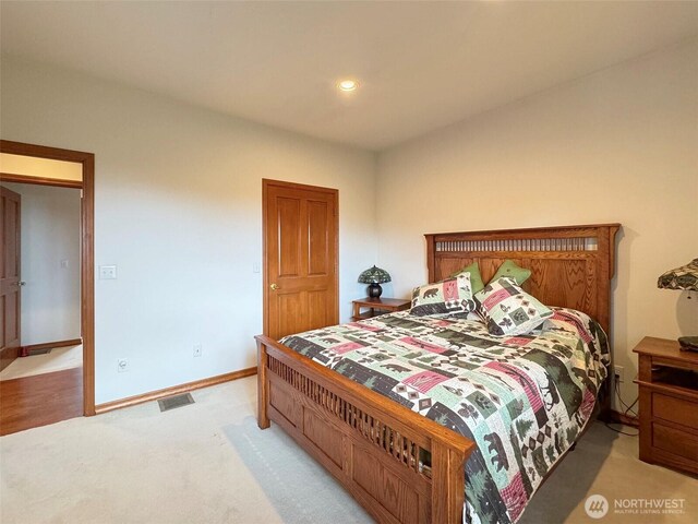 706 W 4th St, Port Angeles, WA 98363 - bedroom featuring baseboards, light carpet, and recessed lighting