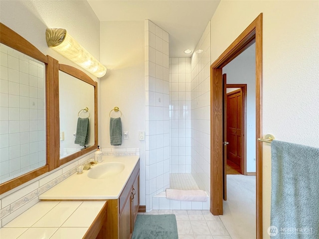 706 W 4th St, Port Angeles, WA 98363 - bathroom featuring a tile shower and vanity