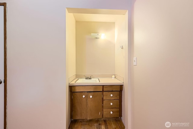 1204 S 229th St, Des Moines, WA 98198 - bathroom featuring wood finished floors and vanity