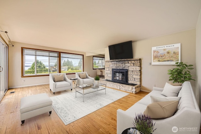 1204 S 229th St, Des Moines, WA 98198 - living room featuring plenty of natural light, light wood-style flooring, and baseboards
