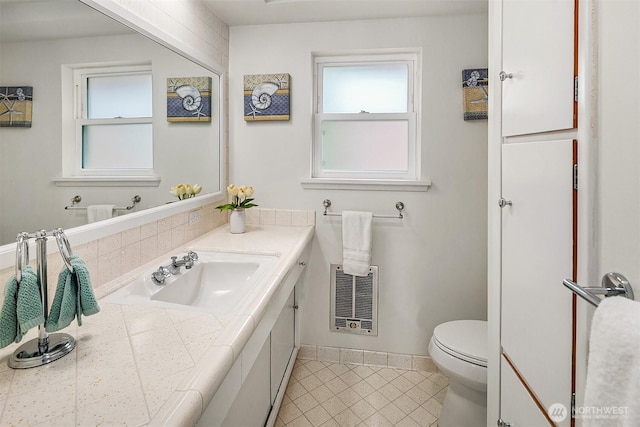12515 2nd Ave NW, Seattle, WA 98177 - bathroom with tile patterned flooring, toilet, baseboards, and vanity