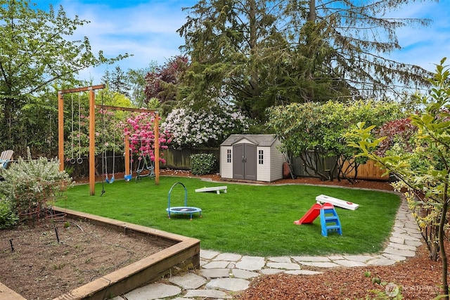 12515 2nd Ave NW, Seattle, WA 98177 - view of yard featuring a storage unit, a playground, and an outbuilding