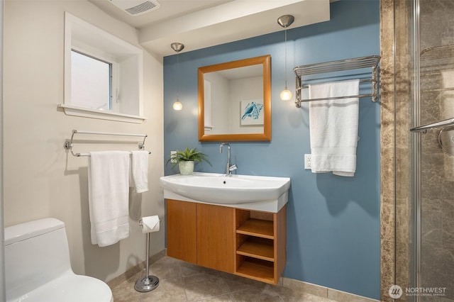 12515 2nd Ave NW, Seattle, WA 98177 - full bath with baseboards, toilet, tile patterned floors, vanity, and a shower with door