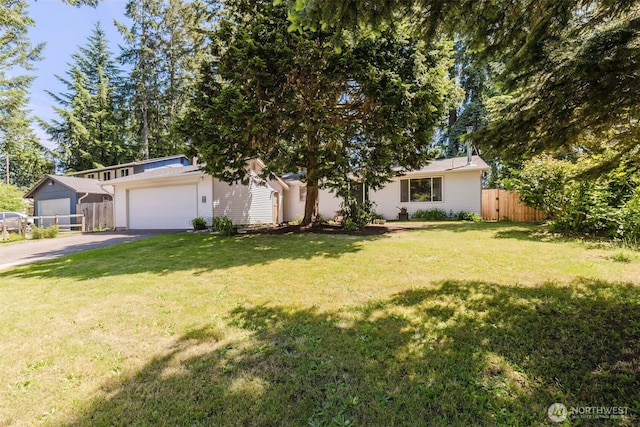 3160 SE Pierson St, Port Orchard, WA 98366 - view of front of house featuring asphalt driveway, an outbuilding, and a garage