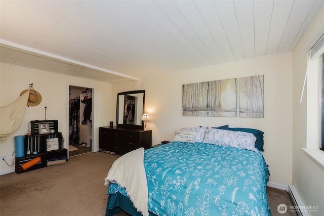 3160 SE Pierson St, Port Orchard, WA 98366 - carpeted bedroom featuring baseboard heating, a closet, a spacious closet, and baseboards