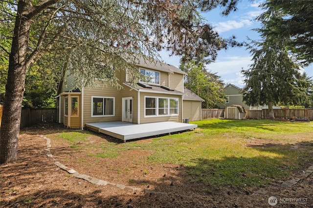 10901 194th Street Ct E, Graham, WA 98338 - back of house with a shed, a wooden deck, and an outdoor structure