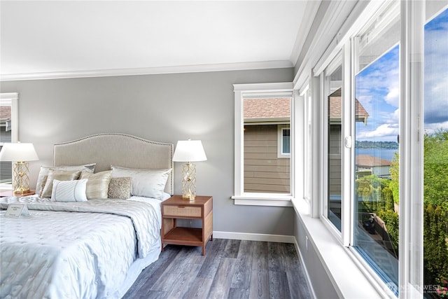 6611 Waterton Cir, Mukilteo, WA 98275 - bedroom with crown molding, dark wood finished floors, and baseboards