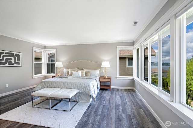 6611 Waterton Cir, Mukilteo, WA 98275 - bedroom with wood finished floors, crown molding, and baseboards