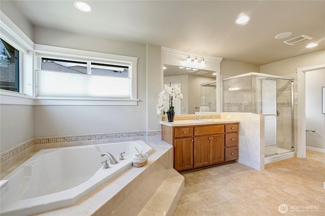 6611 Waterton Cir, Mukilteo, WA 98275 - full bath with vanity, a garden tub, a stall shower, and recessed lighting
