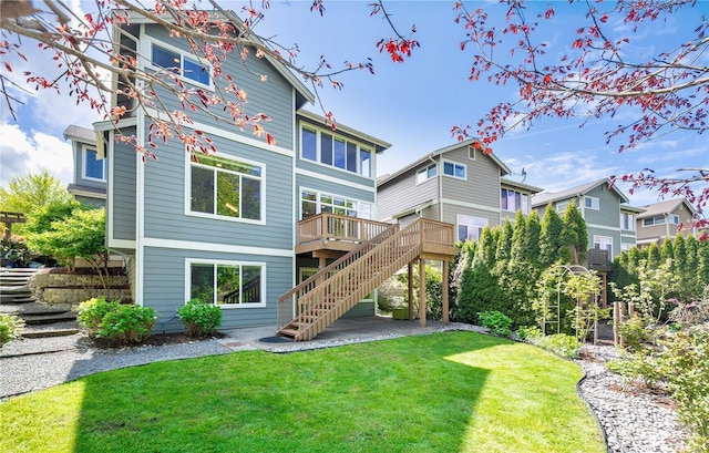6611 Waterton Cir, Mukilteo, WA 98275 - back of property featuring stairs, a wooden deck, a yard, and a patio