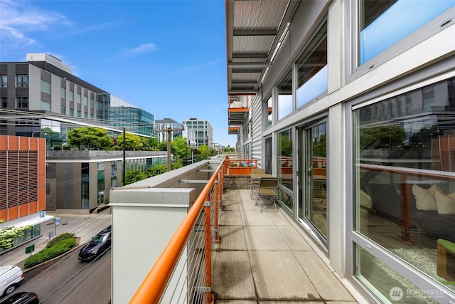 balcony featuring a view of city